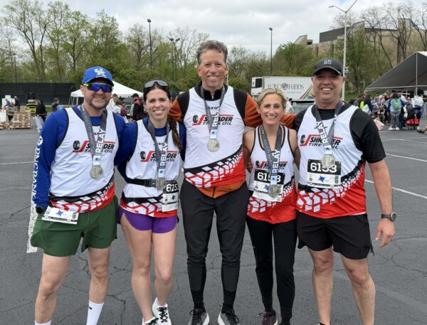 Shrader Tire & Oil relay team at the 2026 Glass City Marathon in Toledo, Ohio