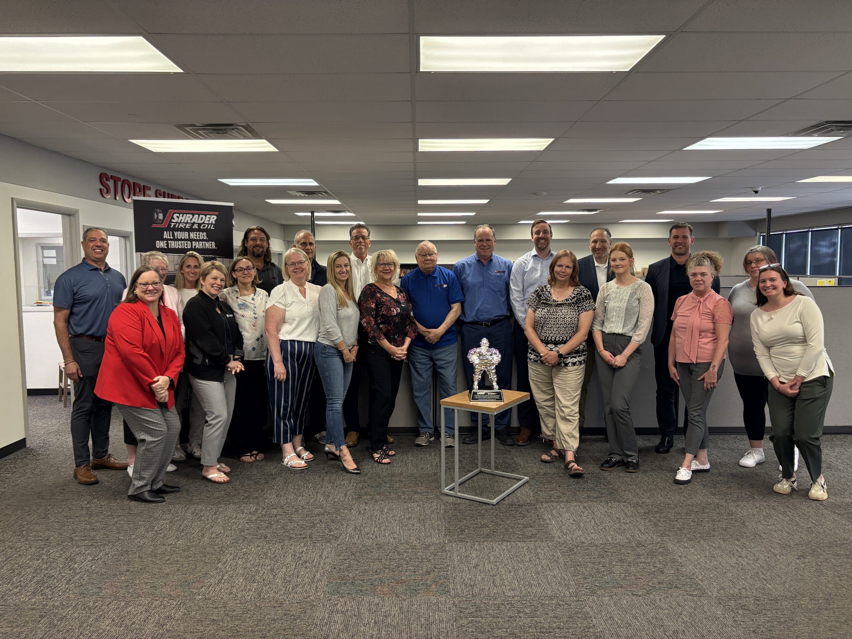 Shrader Tire & Oil team celebrating 20 years as certified Michelin retread plant locations partner