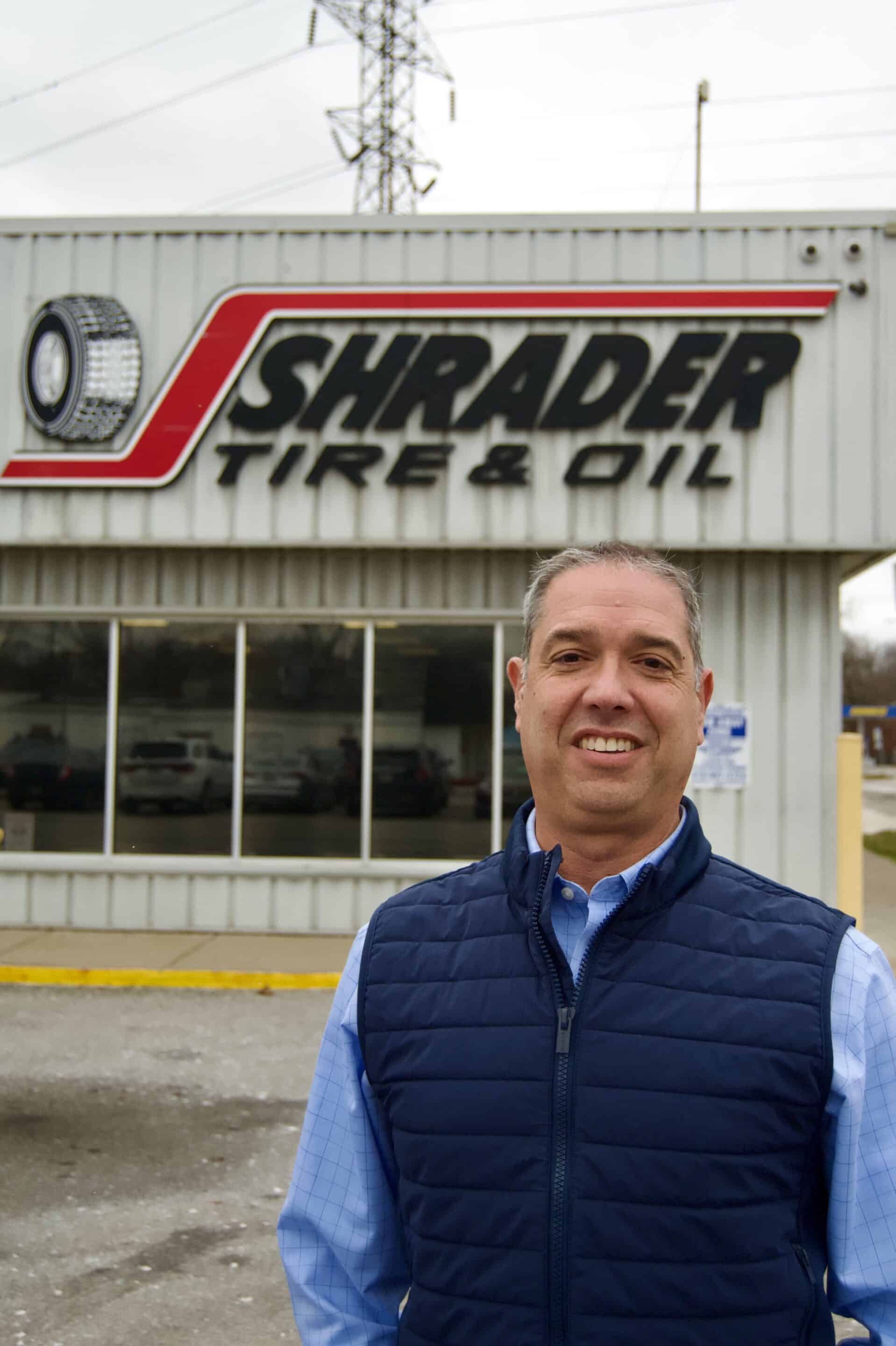 Bob Feldbauer, President and COO of Shrader Tire & Oil, standing outside an STO location.